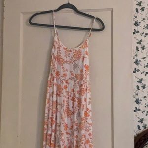 Long, light, summery, floral dress. Cute with cardigan and wedges. Worn once.